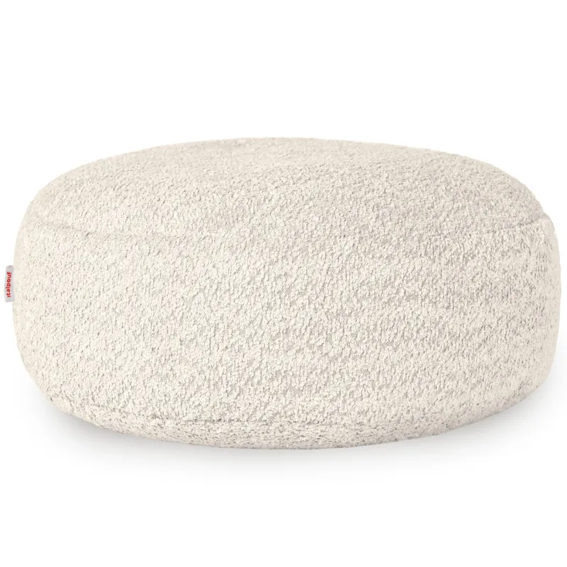 Round boucle footstool, soft texture and contemporary design