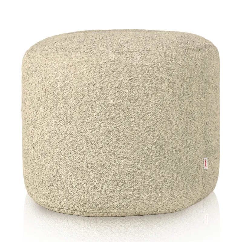 Beige pouf roller with soft boucle fabric for stylish seating