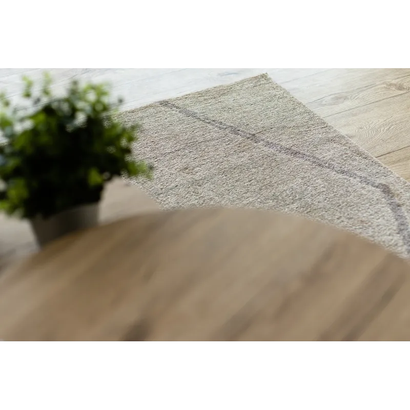 Cream rug with ethnic pattern, perfect for modern interiors