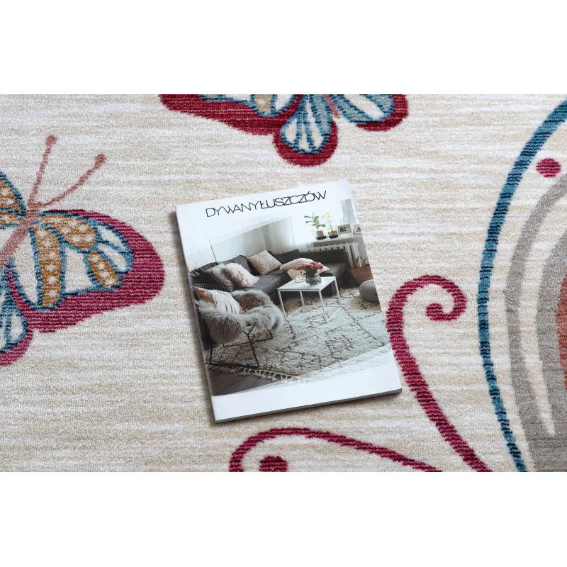 Stylish children's rug in cream and red, modern design