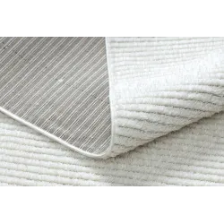 Cream rug for the bedroom, perfect for relaxation
