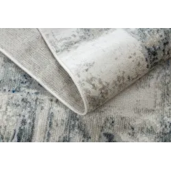 Geometric patterned rug, perfect for modern interior spaces
