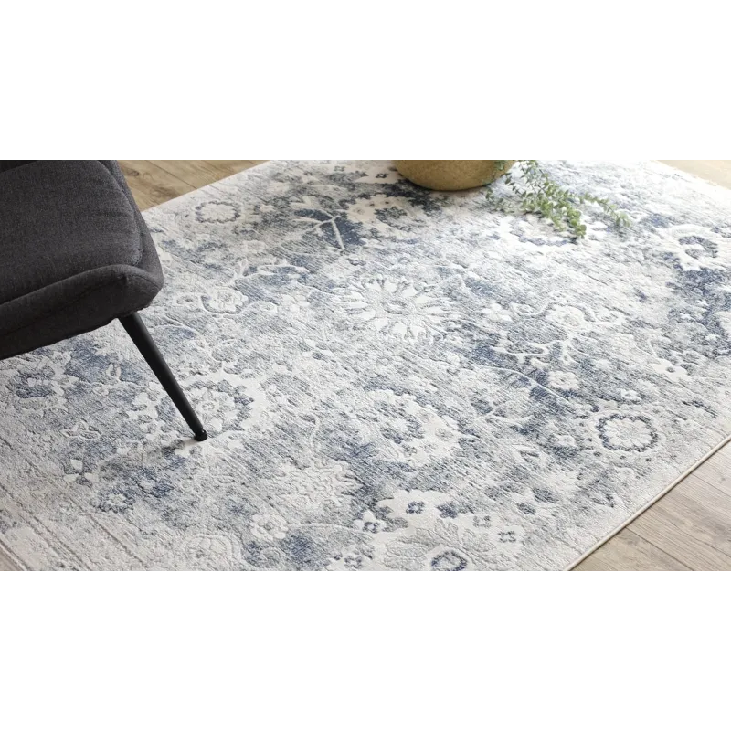 Rug in shades of blue and white, vintage style, classic carpet