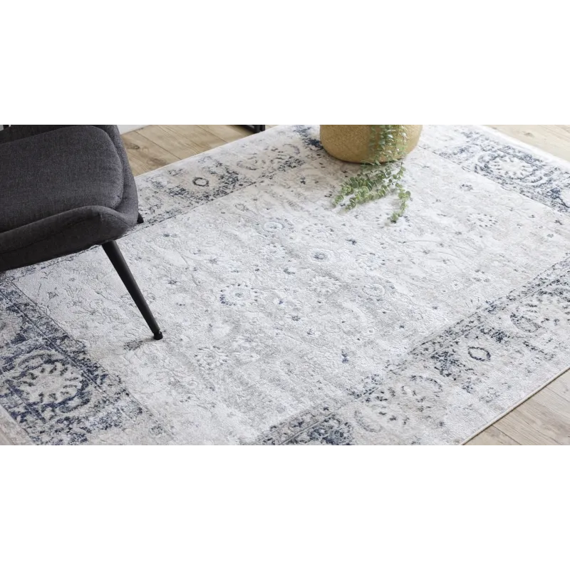 Stylish DISTIN 0843A rug in shades of navy and blue, modern design
