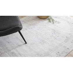 Modern DISTIN 0201A rug in white, blue, and light green with a vintage touch