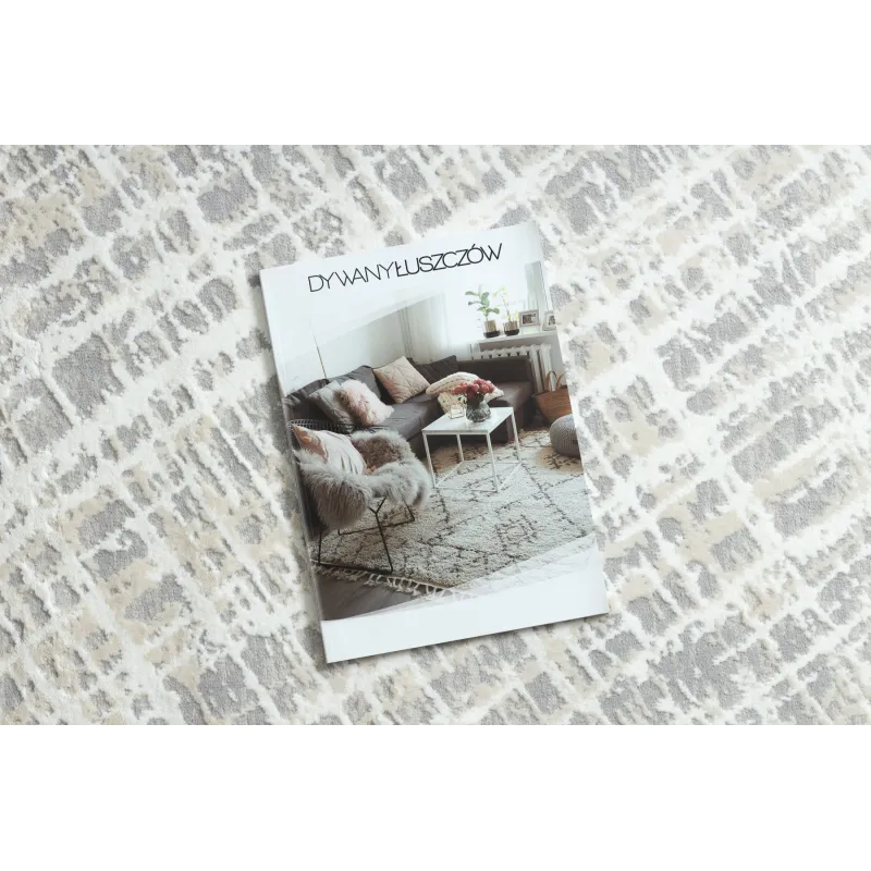 Stylish cream and grey rug, perfect for modern interior decor