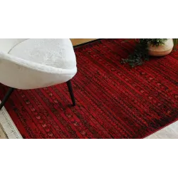 Elegant rug in burgundy with fringes, perfect for home decor