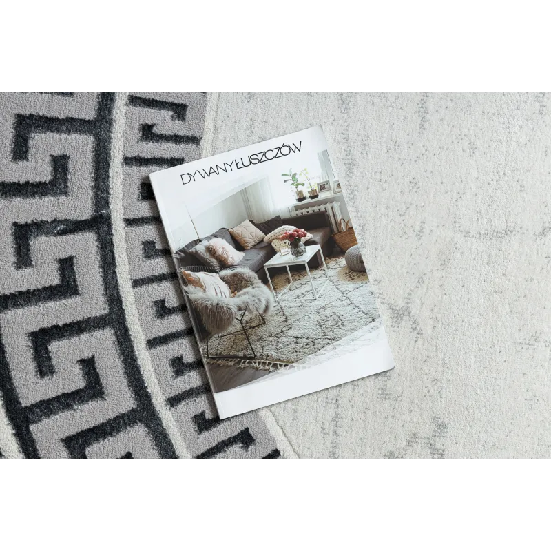 Stylish round rug in white and grey tones, modern design