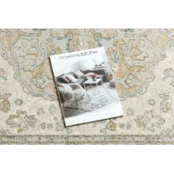 SOHO 477.01.LA113 rug with a decorative green and beige pattern