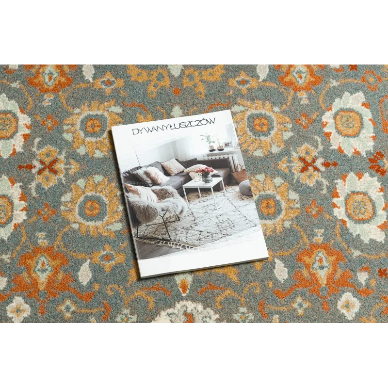 SOHO rug in blue with a terracotta ornament pattern