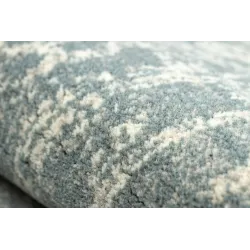 ABBY wool rug 486.10.LA500 for garden or terrace use in blue and beige