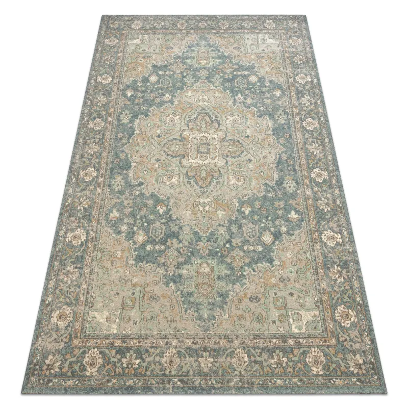 SOHO wool rug featuring a green and blue ornament design