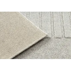 Soft wool rug with a textured pattern, great for the living room
