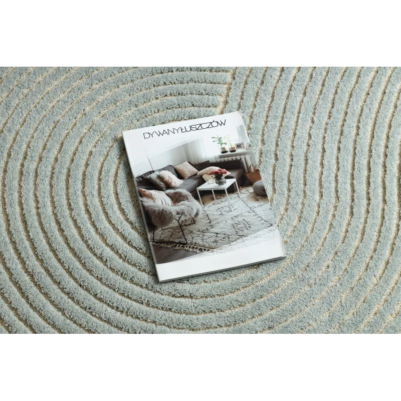 Geometric FLUX rug in blue and cream, perfect for modern interiors