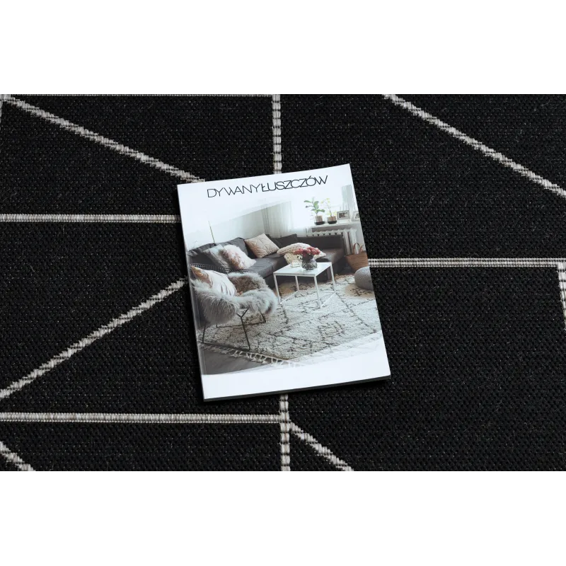 Stylish black and silver sisal carpet with a geometric pattern for contemporary decor
