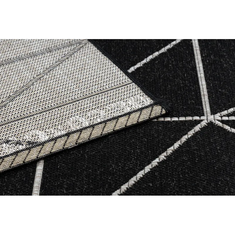 Textured black and silver sisal rug, adding elegance to any space