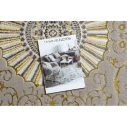 Dark beige rug with gold accents, elegant style for interiors