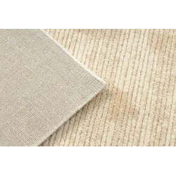 FLUX wool rug with a structural texture in beige shades