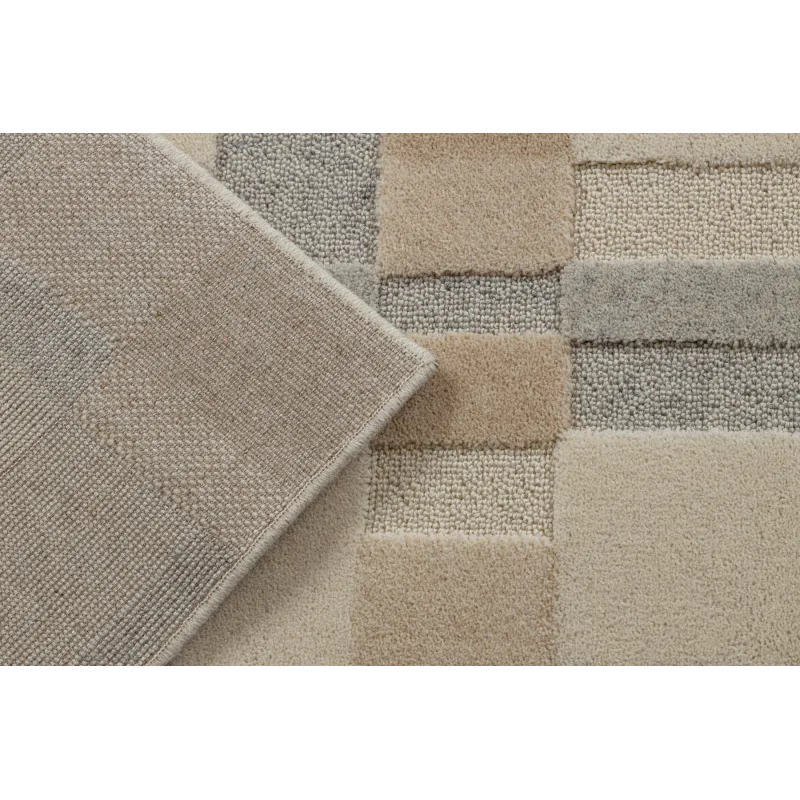 FLUX wool rug with a structural design, great for living rooms or bedrooms